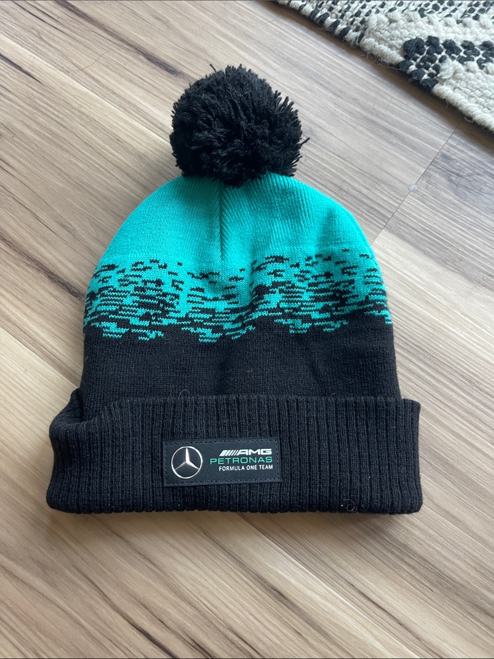 Kids Black & Teal Pom Beanie with Team Patch